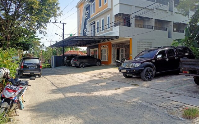 Hotel O Tri Homestay