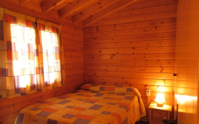 Attractive bungalow with a covered terrace, 1 km. from beach