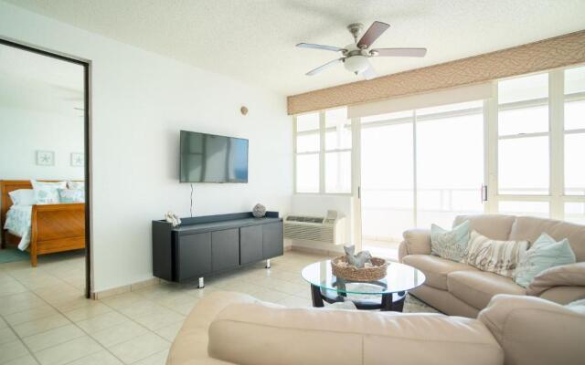 Beachfront Penthouse with Ocean and Sunset Views at Pelican Reef #703