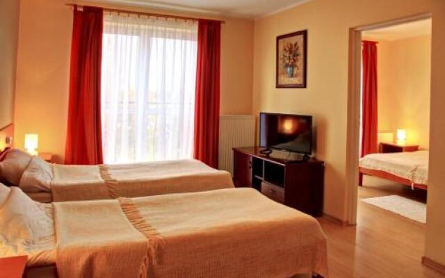 Apartamenty i Restauracja Janus