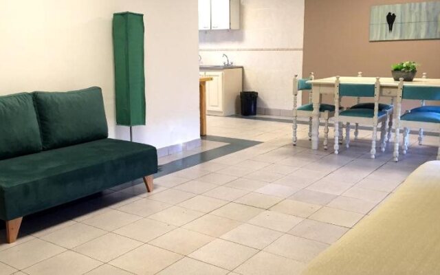 Apart Hotel el Jardin de los Presentes