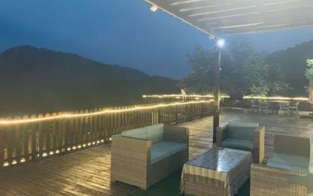Zither Minghua meeting holiday hostel (Xijingyu restaurant)
