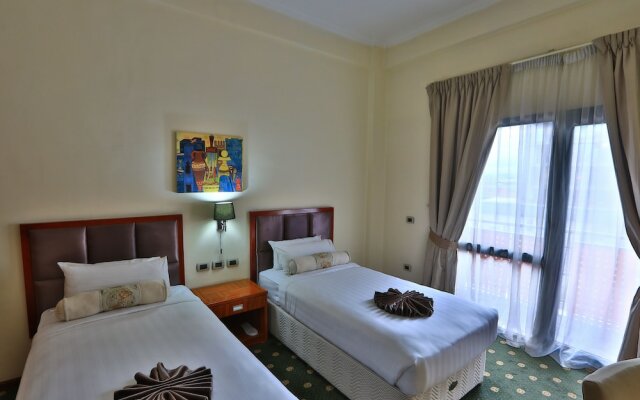 Kenenisa.. Oasis International Hotel