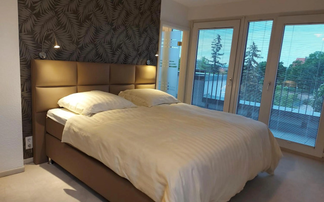 AT THE TOP - Penthouse über den Dächern der Stadt