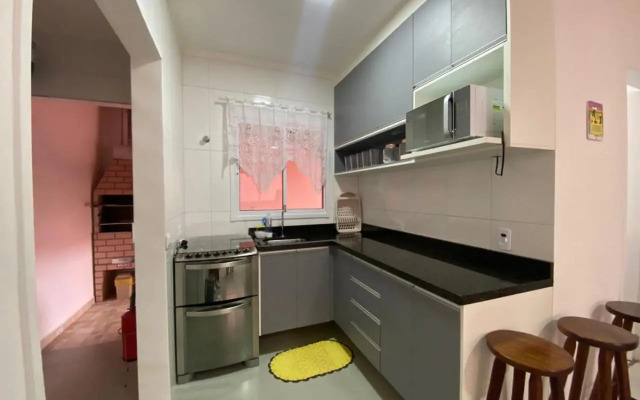 Casa em Bertioga condomínio 250 metros da praia