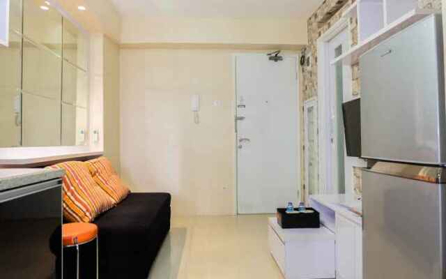 Modern 2BR with City View at Bassura Apartment By Travelio