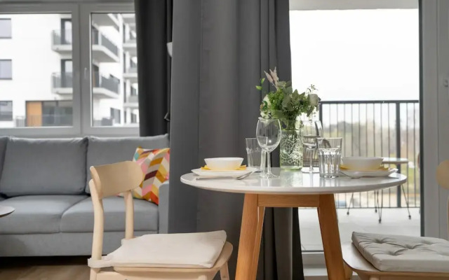 Gray Cosy Studio in Poznań by Renters