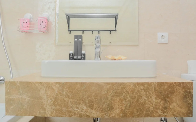 Modern and Functional 2BR Menteng Park Apartment By Travelio