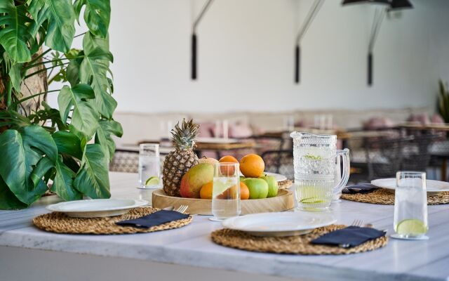 Adorno Beach Hotel & Suites