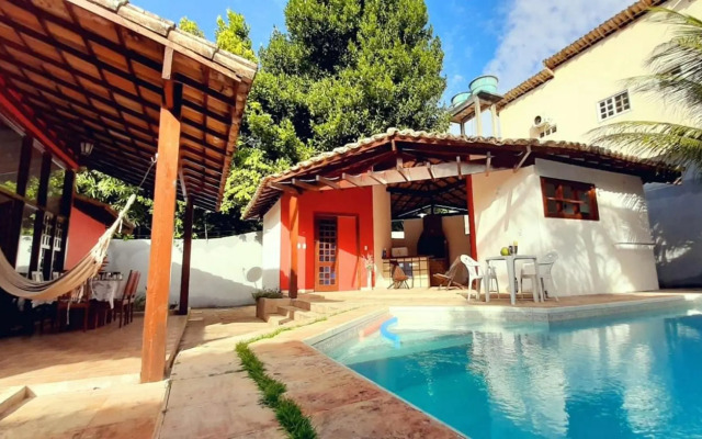 Casa Toscana 4 suítes, piscina e churrasqueira