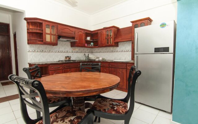 Qi Mag Apartments by OYO