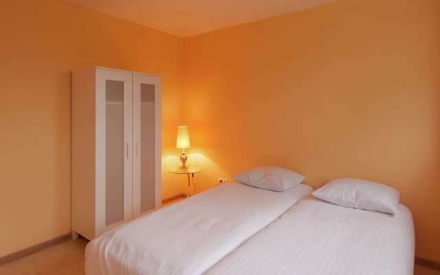 Cozy decorated house with fireplace, surrounded by forest