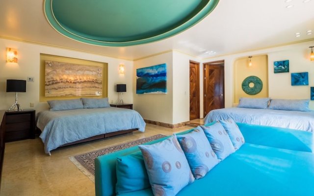 Luna Suite with two king size beds, with walk out terrace overlooking the beach