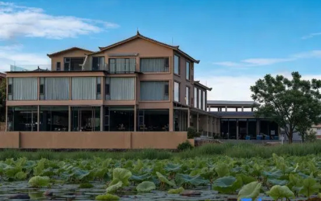 Muke Qianxun Lakeside Vacation Apartment (Puzhehei)