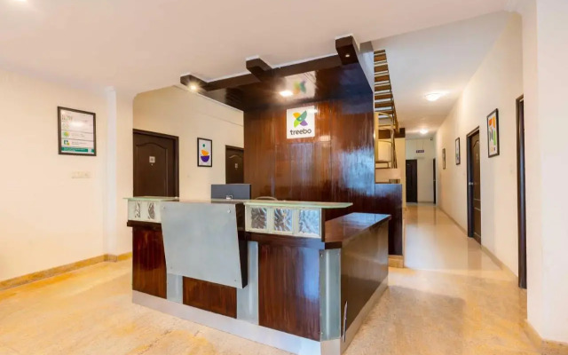 Treebo Ivory White Inn