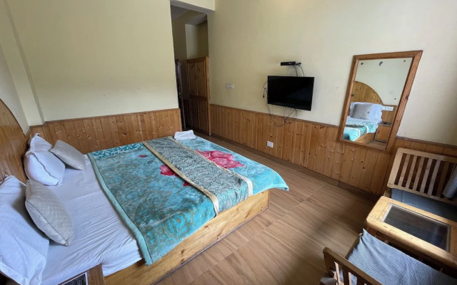 Singh Saab Rooms & Cafe