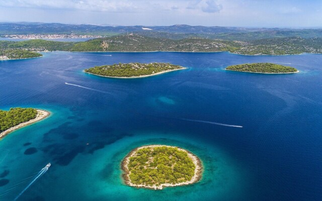 Awesome Home in Jezera with Hot Tub, WiFi & 1 Bedrooms