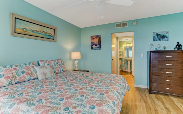 Oceanfront Beach Condo with Private Balcony, Short Walk to Pool and Beach by RedAwning