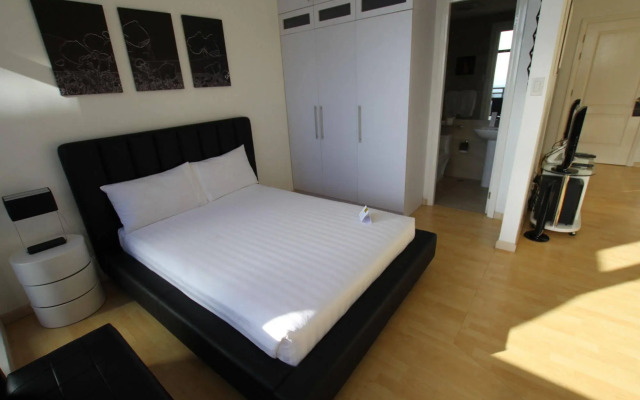 SIGLO SUITES @ The Gramercy Residences