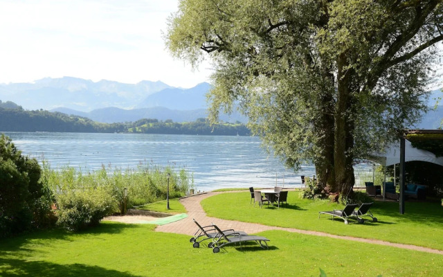 Swiss-Chalet Merlischachen - Historik Chalet-Hotel Lodge