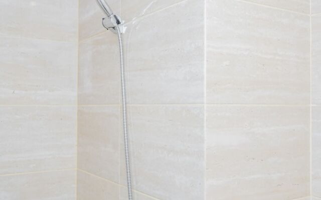 Minimalist and Relaxing Studio Apartment at Springwood Residence