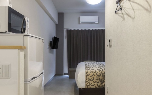 Mr.KINJO in HAIBISU NISHIMACHI – Guest Rooms – Naha