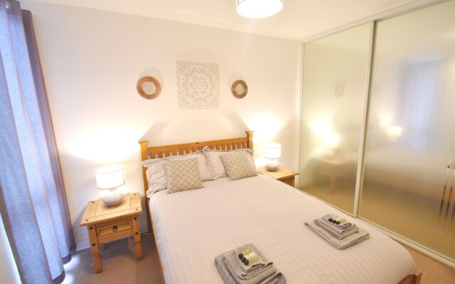 MK Hub Apartment with Oak Furniture