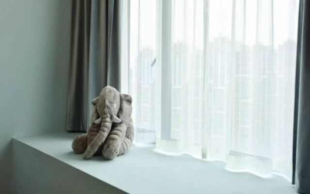Quzhu City Homestay (Shiyan Wanda Plaza Branch)