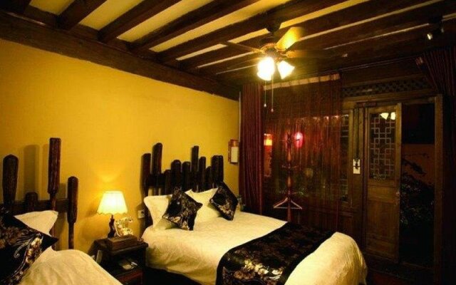Lijiang Yunjin Yaju Courtyard Hotel