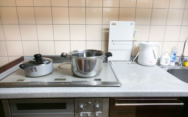 Nishinokyouharamachino Ie