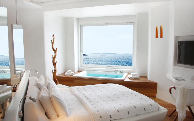 Отель Cavo Tagoo 