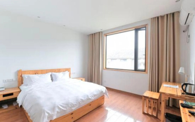 Wangshan Gongshe Featured Hotel