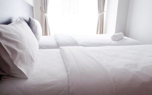 Simply 1br Scientia Residence Apartement Near Summarecon Mall Gading Serpong By Travelio – Guest Rooms – Legok
