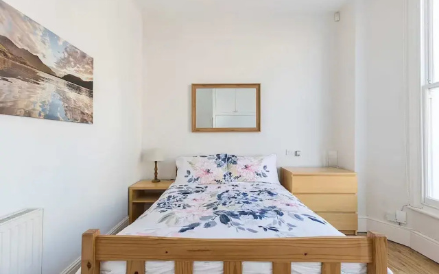 JOIVY Charming 1-Bedroom Flat with Patio