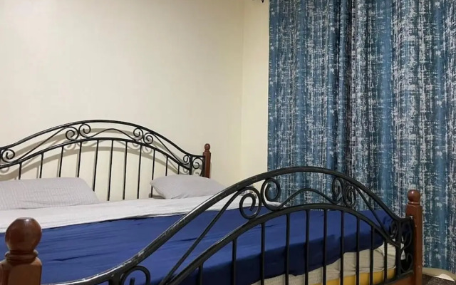 The Mugabi's Spacious Private Room