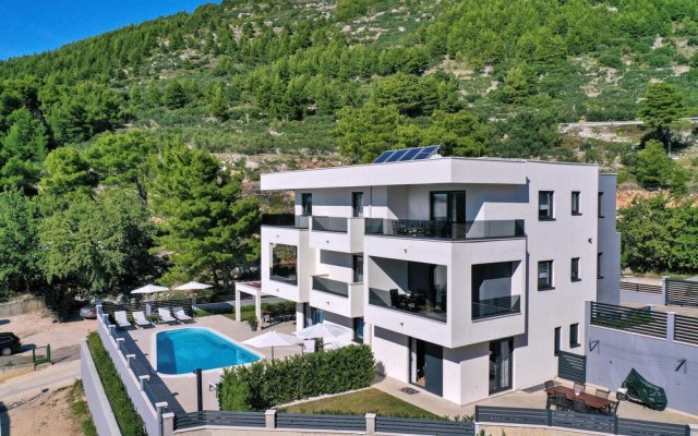 Amazing Apartment in Baska Voda With Wifi, Outdoor Swimming Pool and Heated Swimming Pool