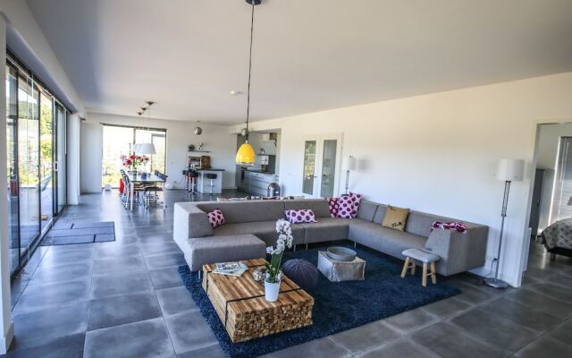 Magnificent waterfront design villa, located near Harderbos