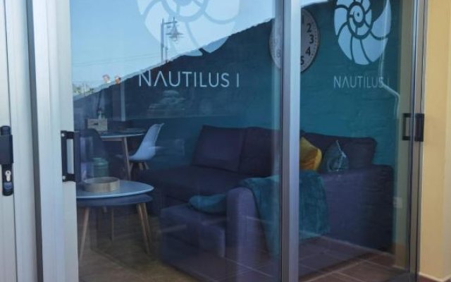 Nautilus I: Casa con terraza y vistas al mar