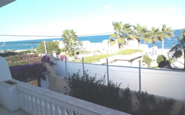 Partie de pittoresque maison en bord de mer