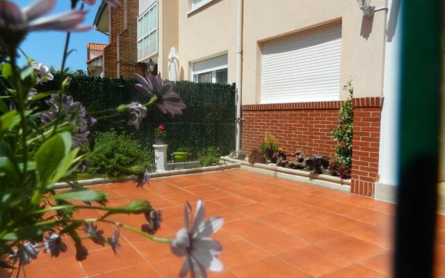 Apartamento con jardin privado junto playa Usil - Mogro