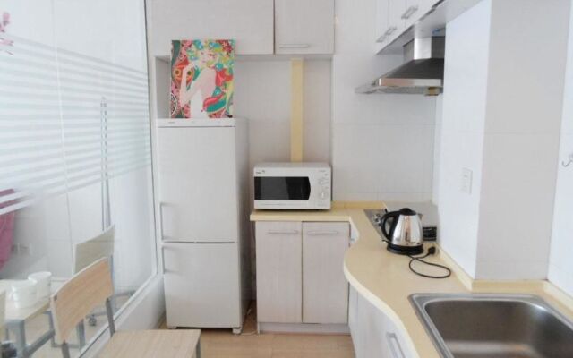 Dalian Jiujiuyuan Hotel Apartment