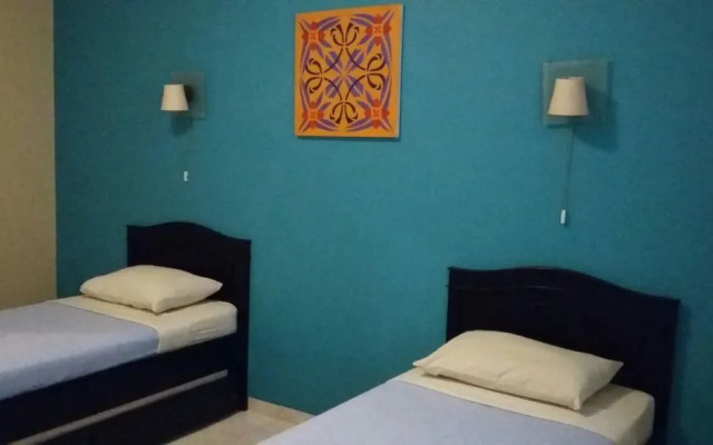 Capital O 1662 Ole Suites Hotel