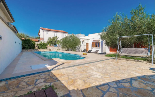 Two-Bedroom Holiday home Jezera with a Fireplace 05