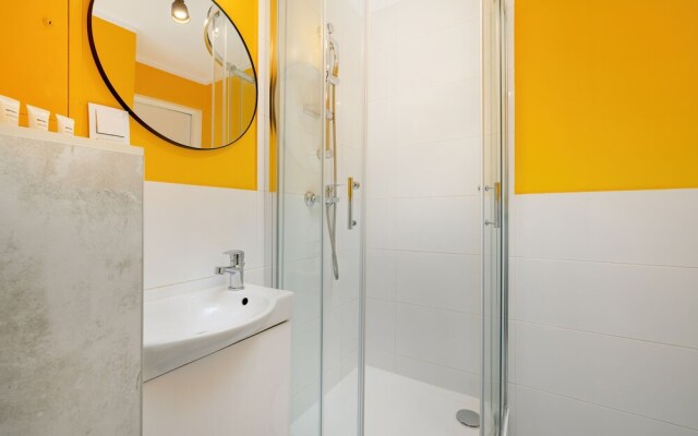 Yellow and Grey Studio by Renters