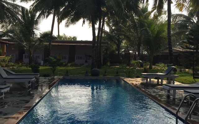 Morjim Coco Palms Resort