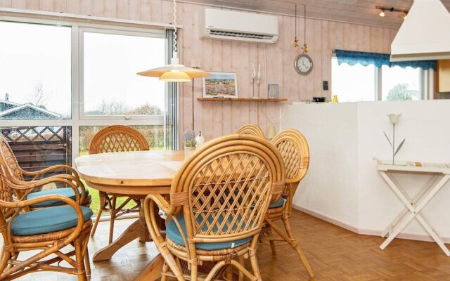 5 person holiday home on a holiday park in Glesborg