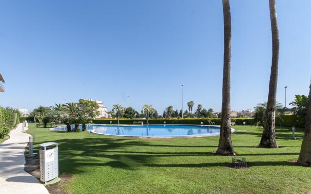 AIRE - Apartment with shared pool in Oliva Nova. Free WiFi