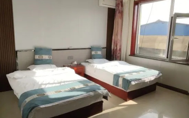 Pianguan Laoniuwan Business Hotel