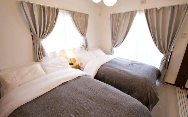 オーシャンテラス瀬底 Room101 – Guest Rooms – Motobu