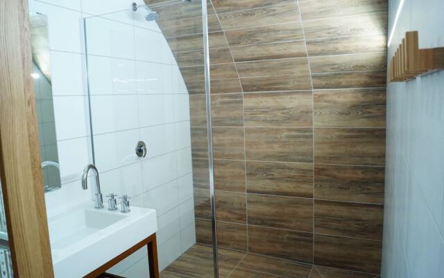 Apartmány u komína